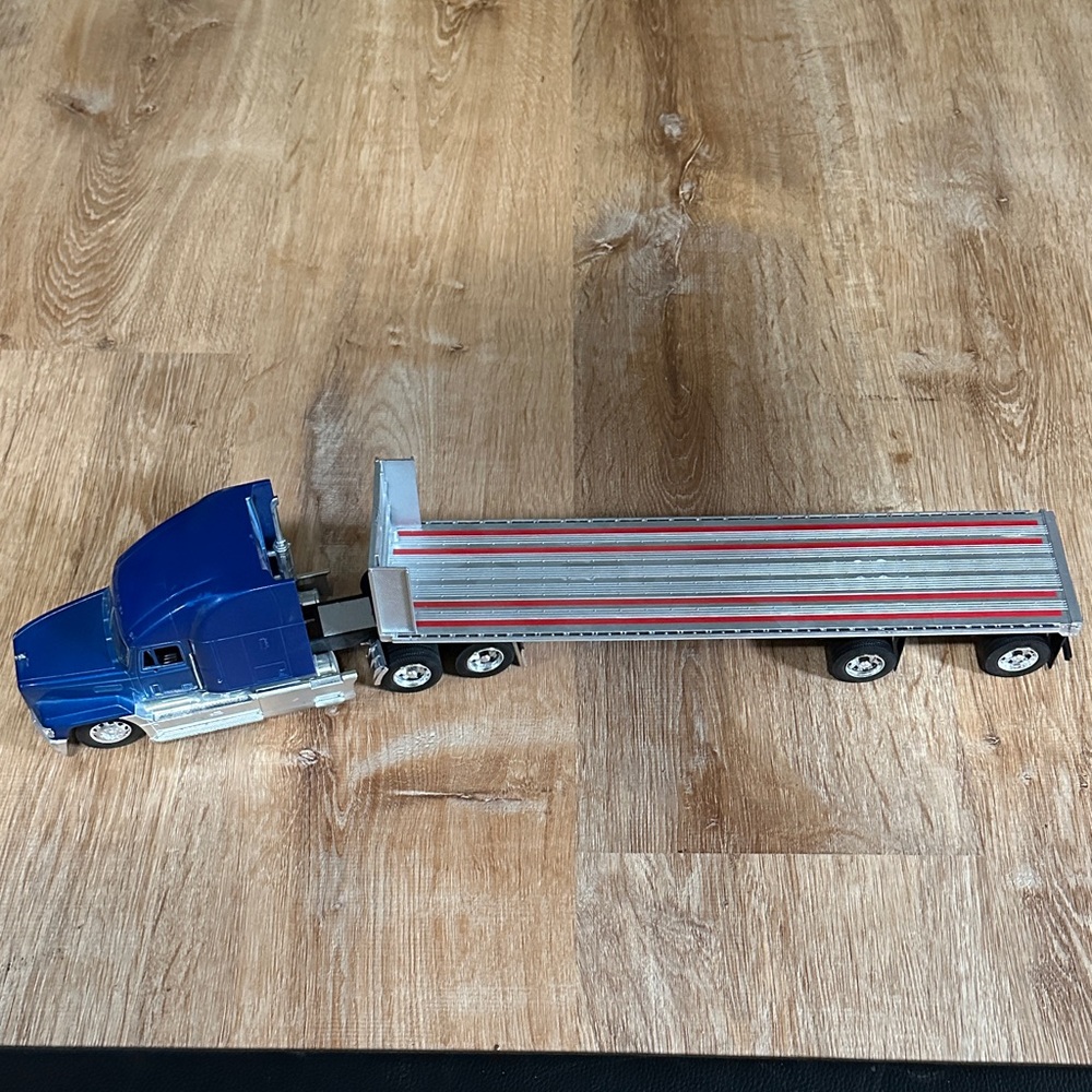 Blue and Silver Toy Truck